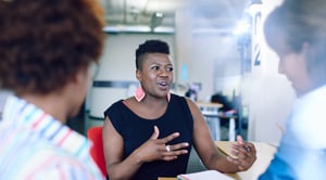 business meeting with black female CEO leading conversation